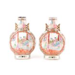 A pair of canton enamel porcelain moon flasks, Bianhu, early 20th century, painted with panels of