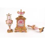 A late 19th-century French ormolu (matched) clock garniture. Comprising an 8-day mantle clock and