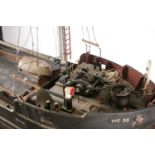 A scratch-built scale model of the 1943 victualing boat the "Clyde Puffer" (VIC 35). 104 cm long x