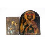 A 19th century European icon with brass mount, depicting the Madonna and Child, 26 cm x 19 cm,