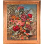 Late 19th or early 20th century school, a large and vibrant still life study of flowers in an urn, a