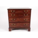 A George III style mahogany bachelor's chest with crossbanded top. Fitted four long drawers. On