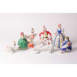 A Duvelo Soviet Russian porcelain figure of a boy riding on a flying swan, together a Soviet