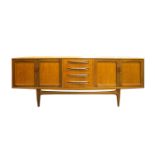 A G-Plan Fresco range teak sideboard, designed by Victor B Wilkins, with four central drawers