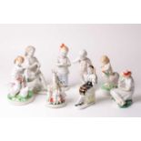 A Dulevo Soviet Russian porcelain figure of a girl feeding chickens together with a LZFI porcelain