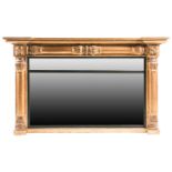 A William IV inverted breakfront carved wood and gilt gesso rectangular overmantle mirror. With