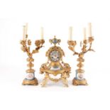 A late 19th century Japy Freres ormolu clock garniture. Mounted with Sevres style porcelain panels