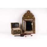A Victorian cast brass stationary casket, the pierced cast griffin heads and foliage against Morocco