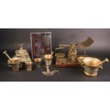 A set of brass Post Office scales, with weights, together with assorted heavy brass pestles and