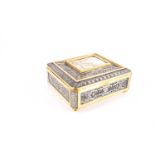 A late 19th or early 20th century gilt and white metal jewellery casket, of rectangular form on four