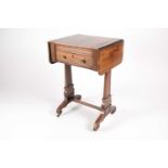 A Regency figured rosewood two flap compendium gaming table. The top with a sliding central