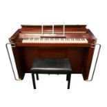 The Eavestaff Pianette 'Minipiano', early 20th century, overstrung on a cast frame, the case with