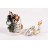 A Lomonosov Soviet Russian porcelain figure a smartly dressed couple, he a fox and she a beaver