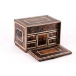 A small Indo-Portuguese blonde tortoiseshell veneered and ivory moulded and strung table casket.