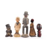 A group of decorative figural toys and sculptures predominantly late-19th early-20th century of