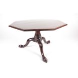 A part George II/III octagonal topped low tripod table, the one-piece Cuban mahogany top with
