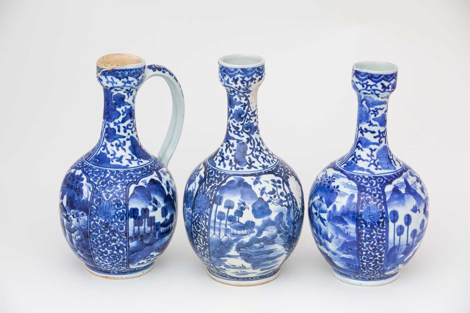 Three Japanese blue & white ewers, circa 1670 -1690, each with oviform body, with cup shape mouth - Image 3 of 4