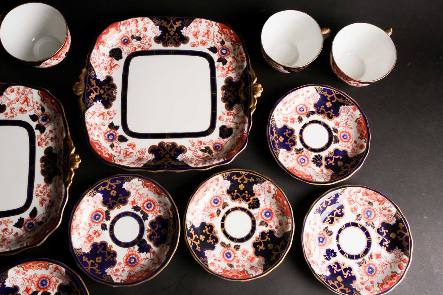 An Edwardian Royal Crown Derby Imari pattern part tea service, for nine place settings, to include a - Image 10 of 10