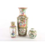 A small Chinese Famille rose rouleau vase, 20th century, the neck and body with lotus flowers,
