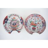 Two Japanese Imari barbers bowls, l7th century, one with moulded lobed rim, each with two pierced