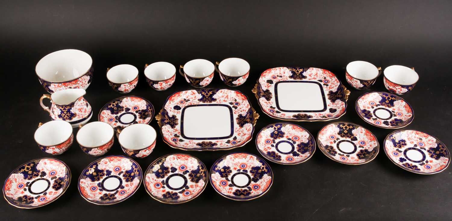 An Edwardian Royal Crown Derby Imari pattern part tea service, for nine place settings, to include a