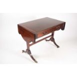 A "Chinese Chippendale" style mahogany two flap sofa table with two frieze drawers and end stile