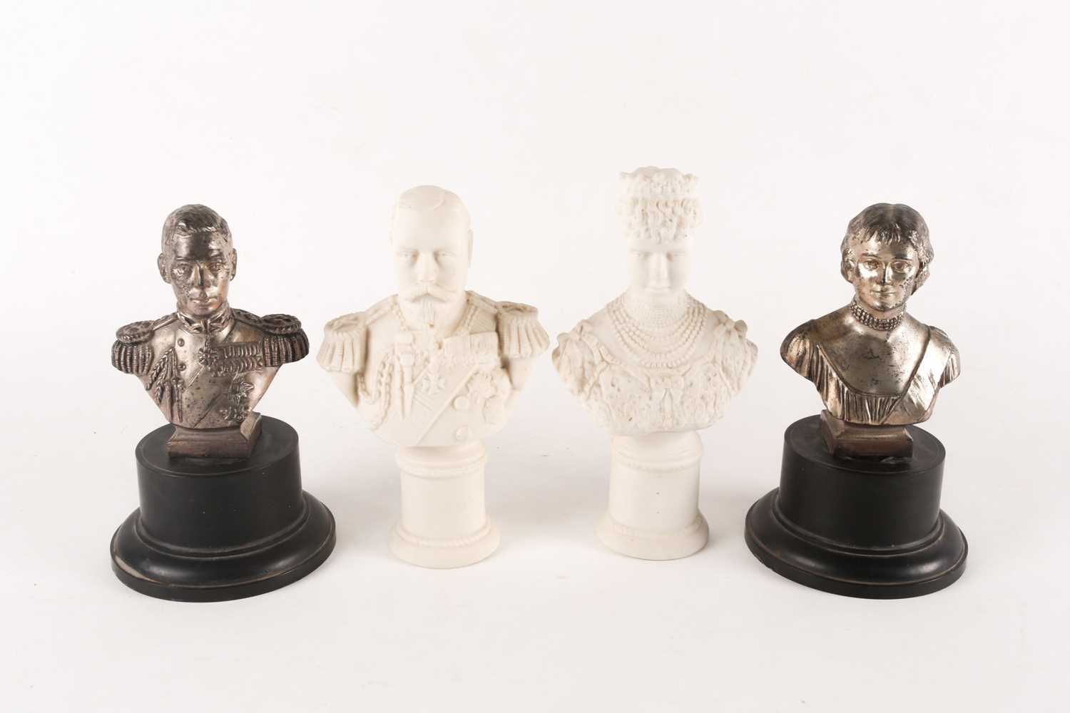 A pair of novelty musical royal portrait busts, depicting HM King George VI and HM Queen