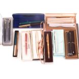 A group of various pens, to include Cross pens, fountain pens, a cased set of two Parker pens, a