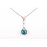 An early to mid 20th century 18ct white gold and blue zircon pendant, set with a mixed round-cut