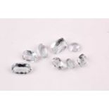 A group of eight various loose aquamarines, of approximately 18.40 carats combined, including a