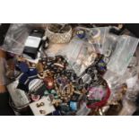 A large box of costume jewellery items, to include various necklaces, rings, bracelets, bangles,