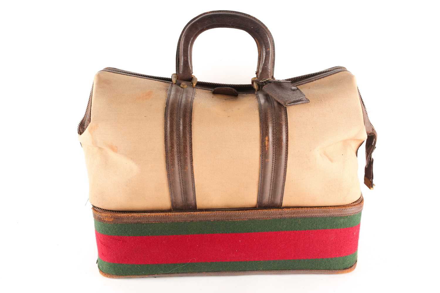 A Vintage Gucci of Italy tan canvas and leather holdall/ weekend bag zipped bottom section with a