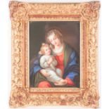 A large 19th century painted porcelain plaque, probably KPM Berlin, depicting the Madonna & Child,