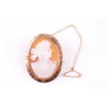 A 9ct yellow gold mounted cameo brooch, depicting a Roman goddess, possibly Selene, within an