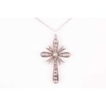 A white metal and diamond cross pendant, set with mixed rose-cut diamonds, 4.5 x 2.9 cm, unmarked,