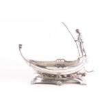 An Art Nouveau WMF centrepiece. In the form of a gondola with a gondolier to the rear holdng a pole;