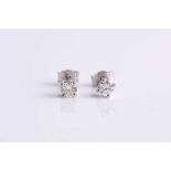A pair of round brilliant-cut diamond ear studs, the diamonds of approximately 0.34 carats