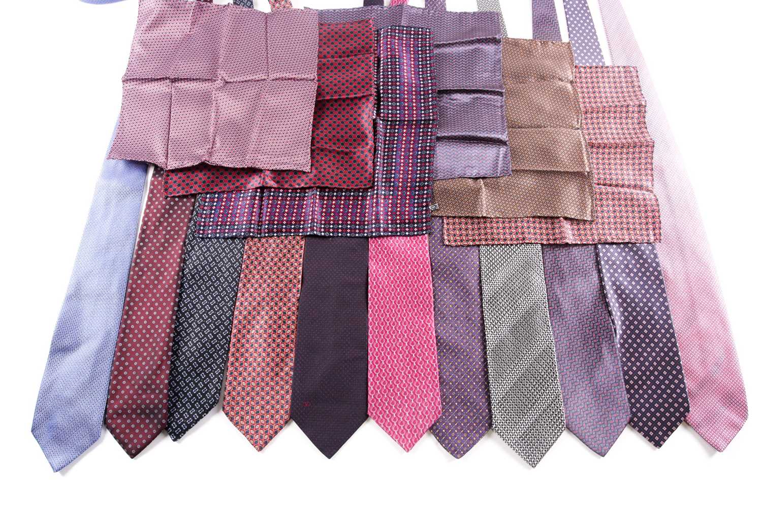A group of eleven various silk ties, including designs by Lanvin, Brioni, and Dupont, and four