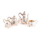 A Victorian silver four piece tea service by Daniel and Charles Houle, the coffee pot and the tea