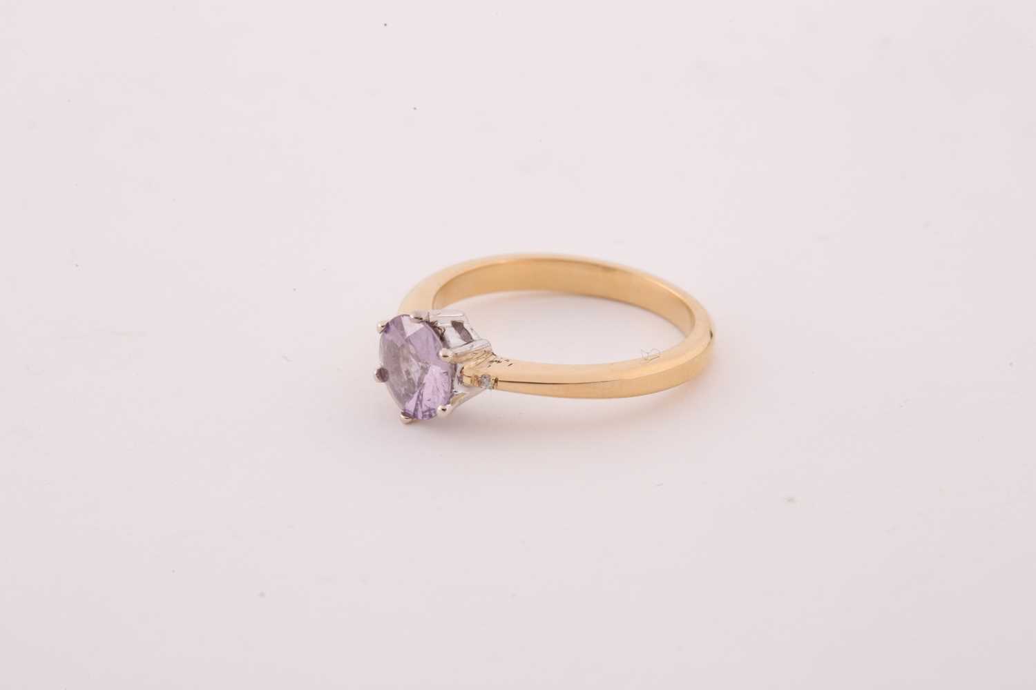 An 18ct yellow gold and solitaire sapphire ring, set with a mixed round-cut pink sapphire, - Image 4 of 4
