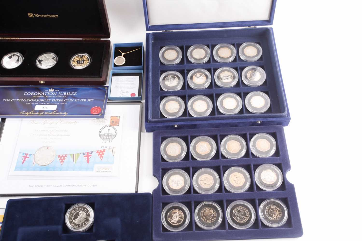 Seven boxed commemorative coin sets, comprising: 1953 Coronation Sixpence in gold-plated diamond - Image 7 of 7