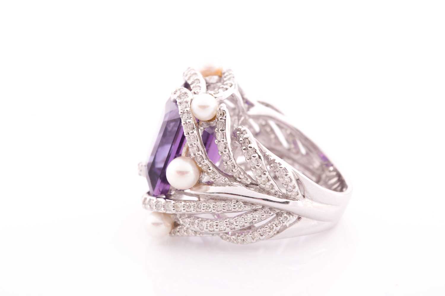 An impressive diamond and amethyst cocktail ring, centred with a mixed square-cut amethyst, - Image 5 of 6