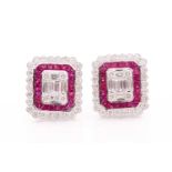 A pair of diamond and ruby earrings, the rectangular earrings inset with emerald and round-cut