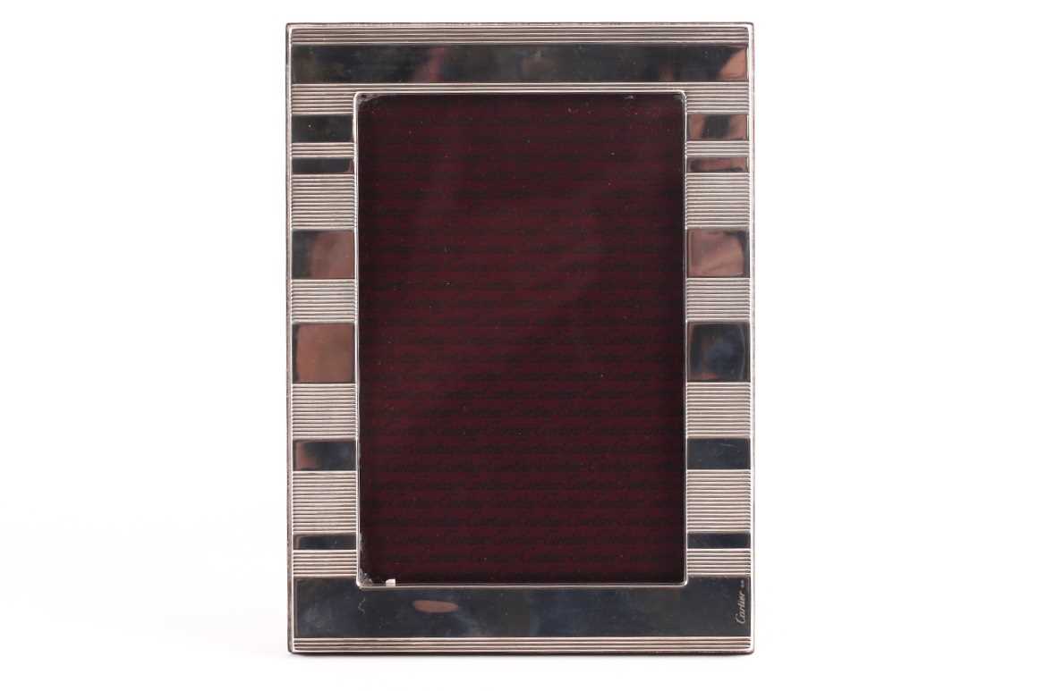 Cartier. A silver photograph frame; rounded rectangular with horizontally banded decoration. - Image 2 of 6