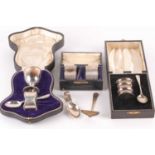 A cased silver Christening set. Birmingham 1915 and later spoon and pusher. The set comprising an