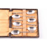 A set of six Chinese silver Apostle spoons, each terminal set with a Chinese robed figure, bamboo-