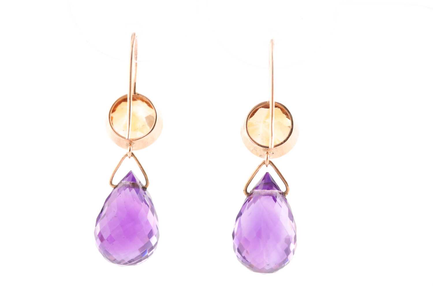 A pair of amethyst and citrine pendant earrings, the faceted pear shaped amythests suspended from - Image 2 of 2