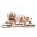 A pair of 19th century silver plated tureens and covers, the covers with shield shape cartouch