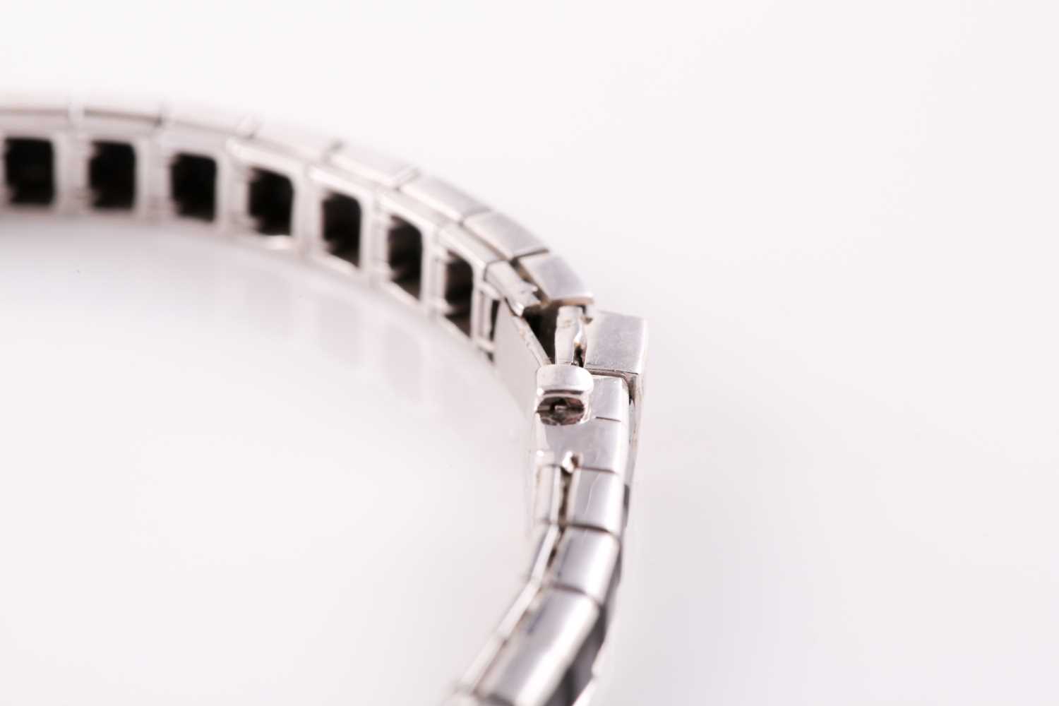 An 18ct white gold, diamond, and onyx line bracelet, the segments set with square-cut black onyx, - Image 5 of 6