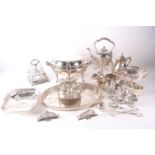 A large group of silver plated items, to include a spirit kettle and stand, an oval tray, cruets,